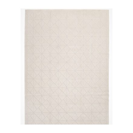 Modern téglalap alakú krémfehér színű mesterséges gyapjú szőnyeg.